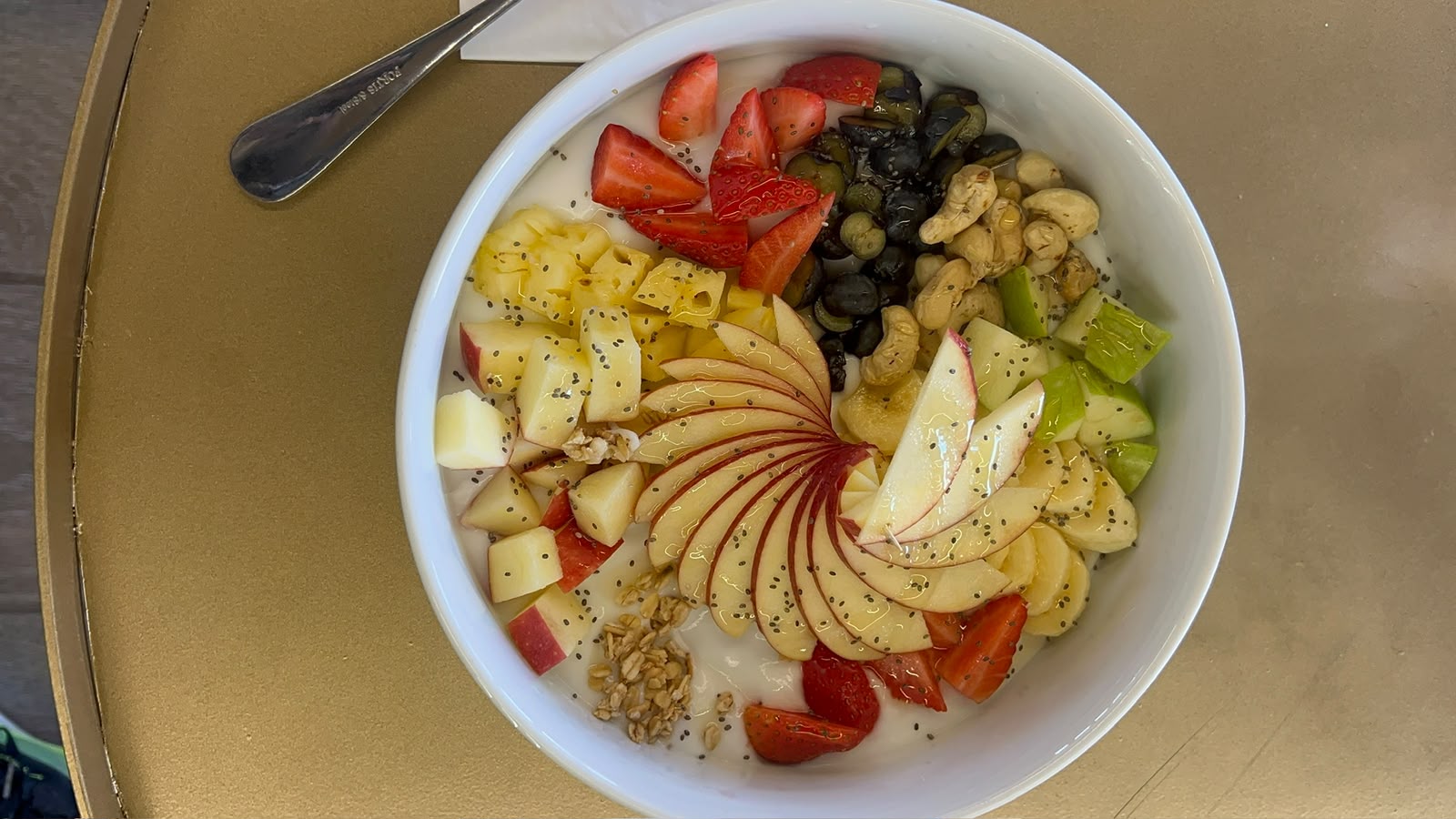 Fresh fruit, granola and chia breakfast bowl